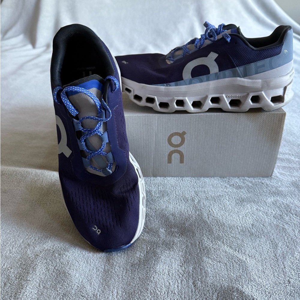 On Running Cloudstratus Blue and White Sneakers
